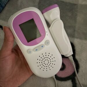White and Purple Handheld Device